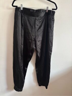 ATM black satin pants with elastic waistband and tapered fit